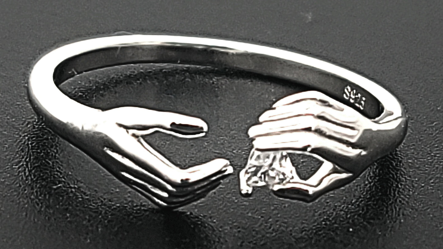 Two Hands, One Spark Sterling Silver with Zircon Adjustable Ring