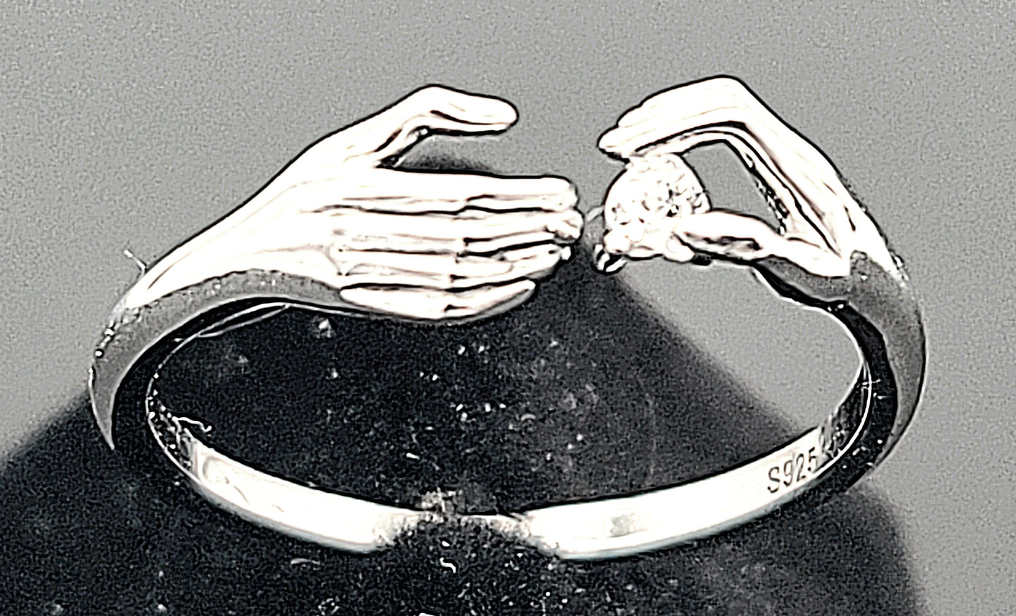 Two Hands, One Spark Sterling Silver with Zircon Adjustable Ring