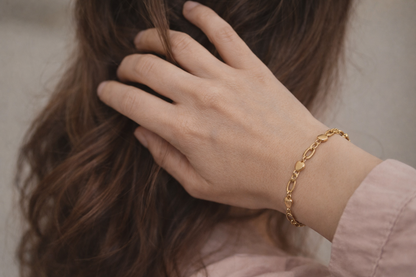 Heartlinks of Steel: Sleek Gold Stainless Romance Bracelet