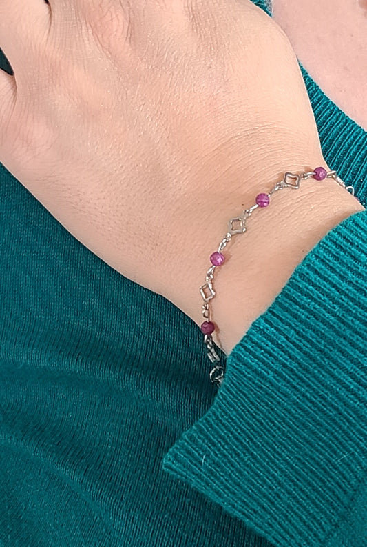 Red Ruby Radiance – Stainless Steel Clover and Natural Ruby Bracelet