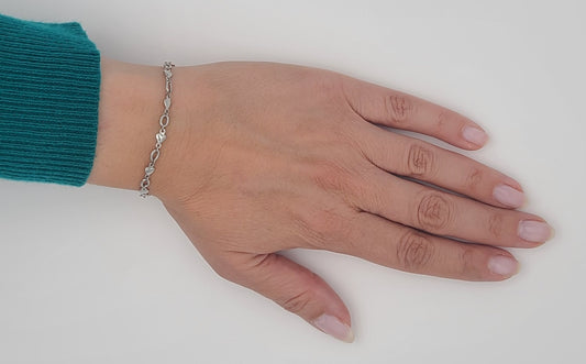 Heartlinks of Steel: Sleek Stainless Romance Bracelet