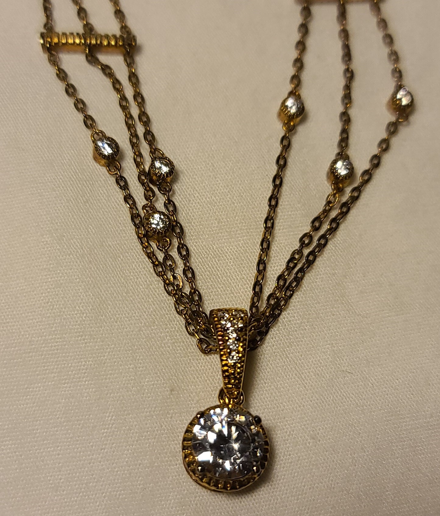Layered 3 Chain Necklace with Cubic Zirconia Stations & Pendant