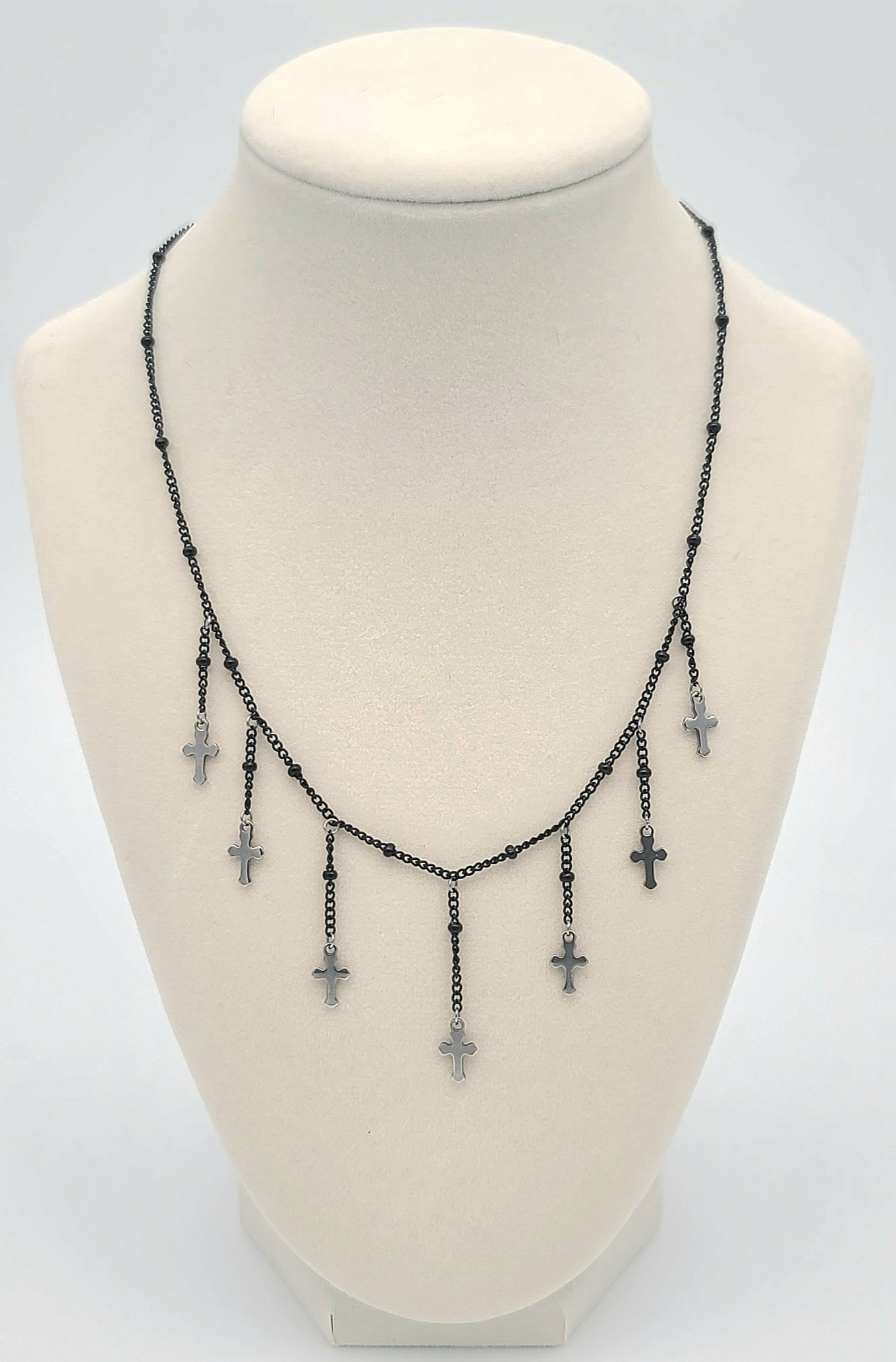 Midnight Cascade Cross Necklace