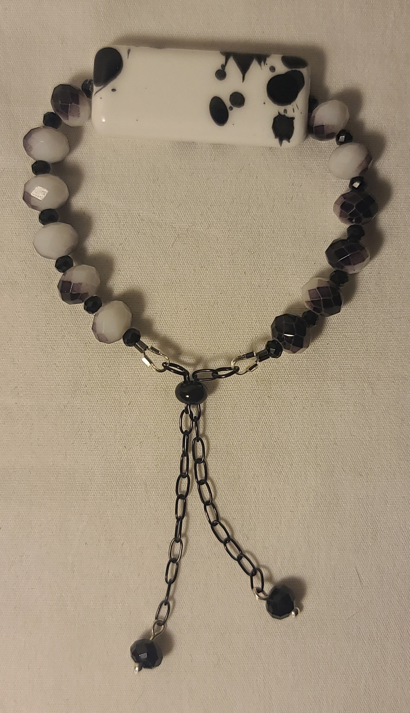 Black & White Beaded Bracelet with Statement Centerpiece Handmade Stainless Steel with Adjustable Length Bolo