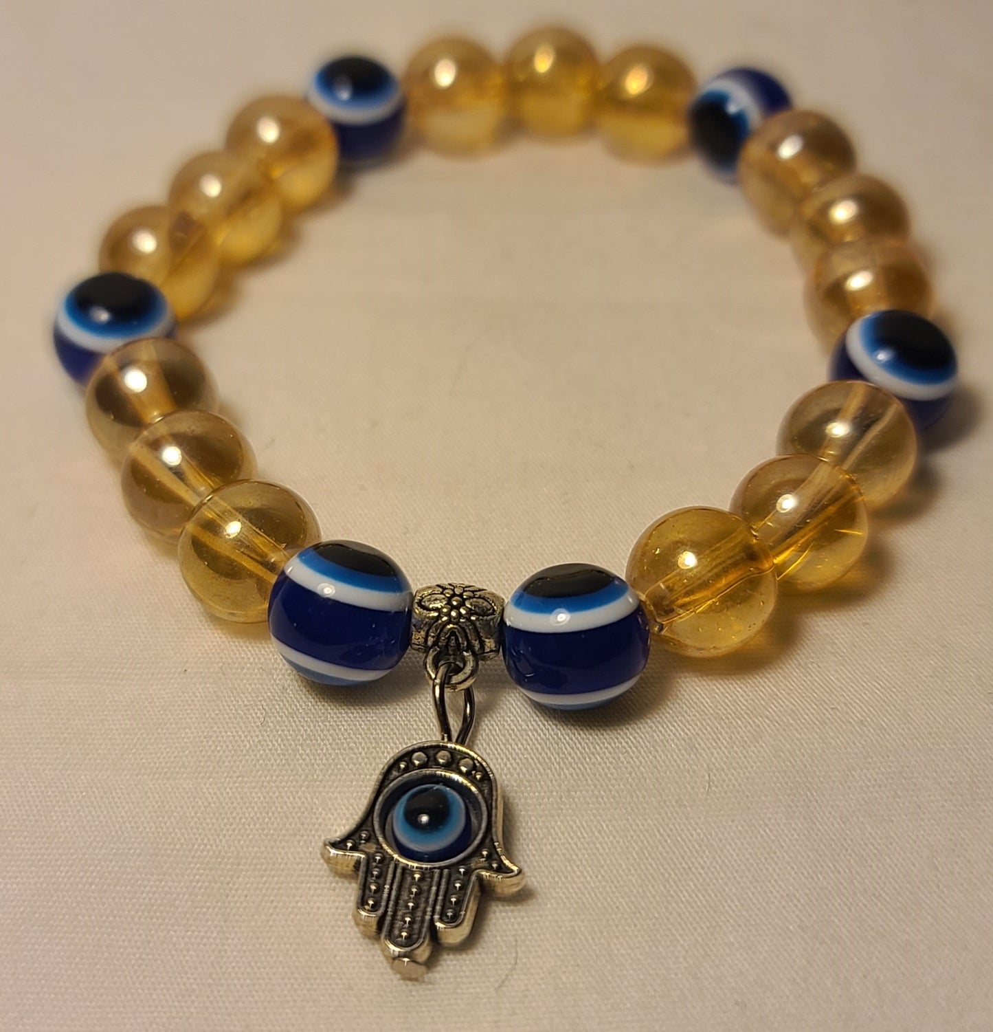 Evil Eye Stretch Bracelet – Hamsa Hand Charm, Amber Glass Beads, Protection Jewelry