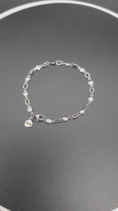 Heartlinks of Steel: Sleek Stainless Romance Bracelet
